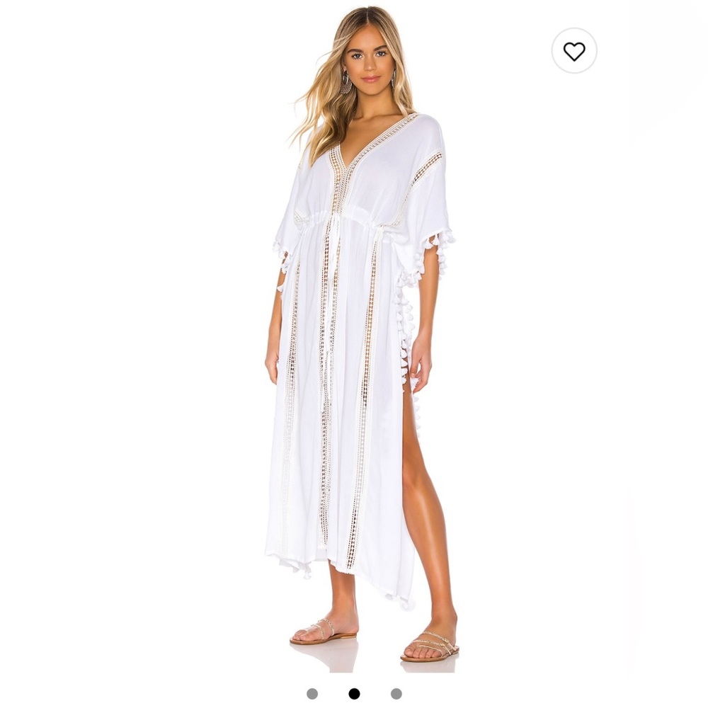 Michael stars eyelit cut out.Unlined.Adjustable draw string waist. Tassel fringe